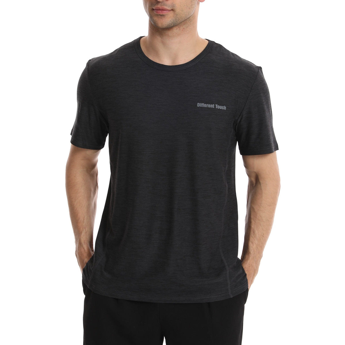 Man wearing a black t-shirt with a logo on a white background