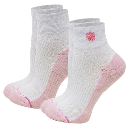 Two pairs of white Quarter Compression socks with pink accents on a white background