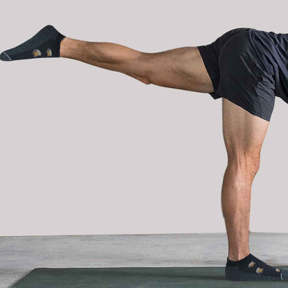 Men’s ankle compression socks with moisture-wicking yarns and cushioned support