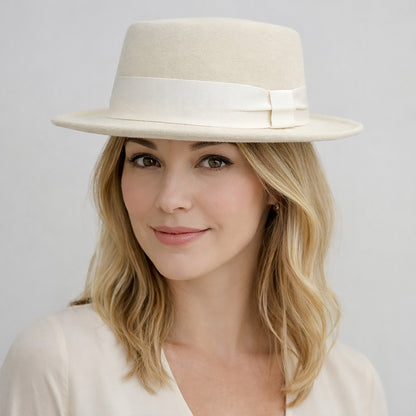 a Woman wearing lovery fedora hats 