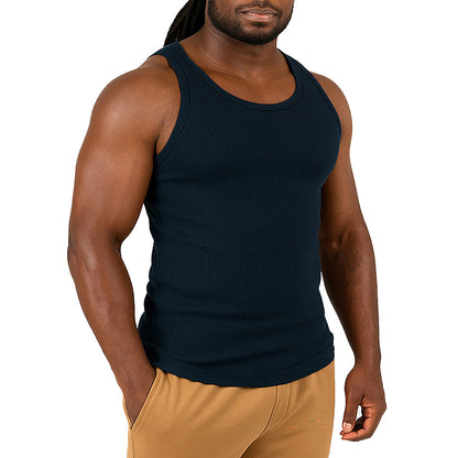 Man wearing a black tank top  on a white background
